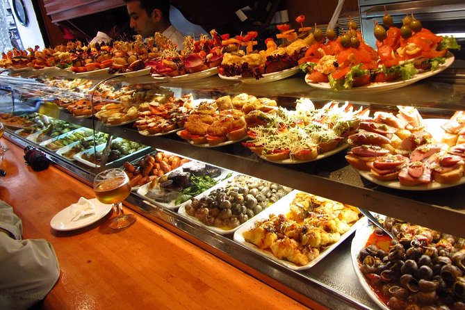 Barcelona Old Town Night Small Group Tour with Tapas & Flamenco - Las Ramblas after dark