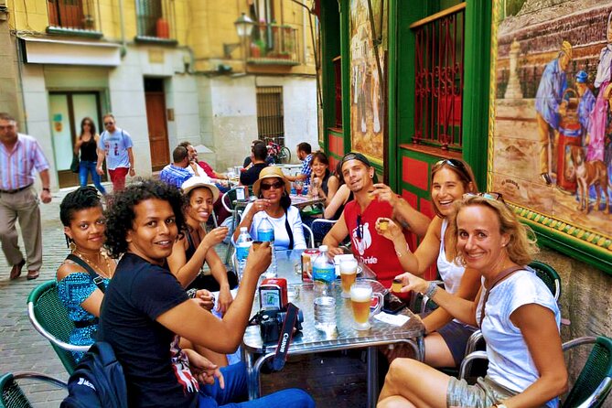 Flavours & Flamenco in Madrid Experience + Pub Crawl - Churros, chocolate, and a madroño shot in Puerta del Sol
