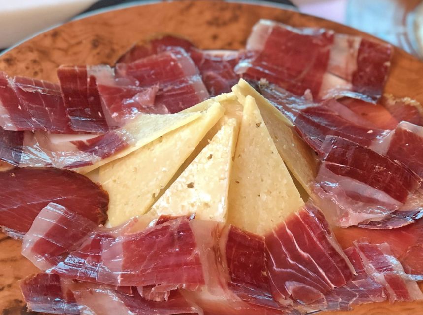 Madrid: Los Porches Flamenco Show with Tapas and Wine Ticket - Timing, language, and practical planning