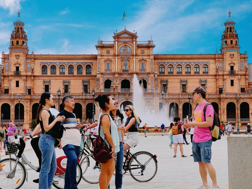 Seville FullDay Tour: Alcázar, Cathedral + Triana & Flamenco - Plaza de España, a grand opening scene